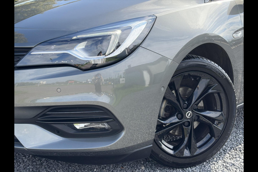 Opel Astra Sports Tourer 1.2 Ultimate ✓146pk✓Carplay✓Camera✓Stoelverw✓Stuurverw✓Keyless✓Pdc V+A✓Alcantara-Leder✓Clima✓Cruise✓6 Bak✓Rijstrooksensor✓Dodehoeksensor✓17''Lm velgen✓N.A.P✓Apk tot 11-2028