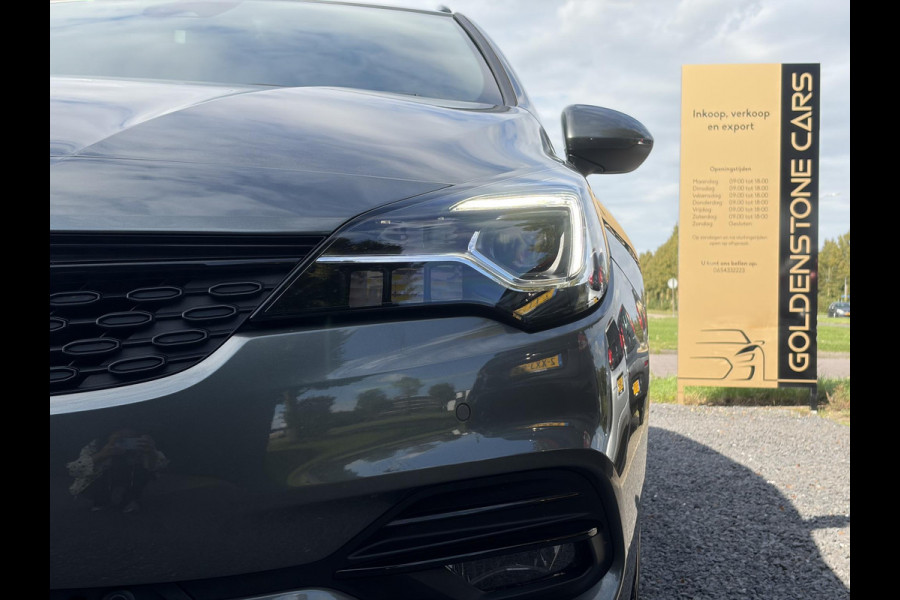 Opel Astra Sports Tourer 1.2 Ultimate ✓146pk✓Carplay✓Camera✓Stoelverw✓Stuurverw✓Keyless✓Pdc V+A✓Alcantara-Leder✓Clima✓Cruise✓6 Bak✓Rijstrooksensor✓Dodehoeksensor✓17''Lm velgen✓N.A.P✓Apk tot 11-2028