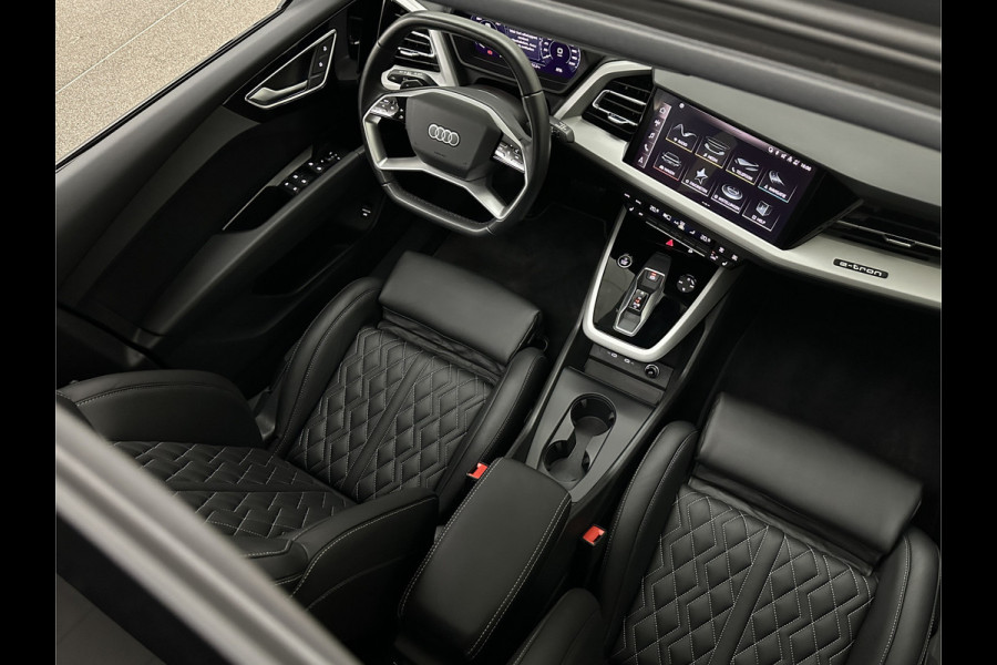 Audi Q4 e-tron 40 S-Line 77 kWh | Panorama | #RS-Leder | Warmtepomp | Sportstoelen | ACC | Lane Ass. | 5x Q4 op voorraad! | MMi+ | Virtual-Cockpit | 3-Zone Climate Control | Getint Glas | Zwarte Hemel | Elktr. A klep | Kieselgrijs | Btw Auto.