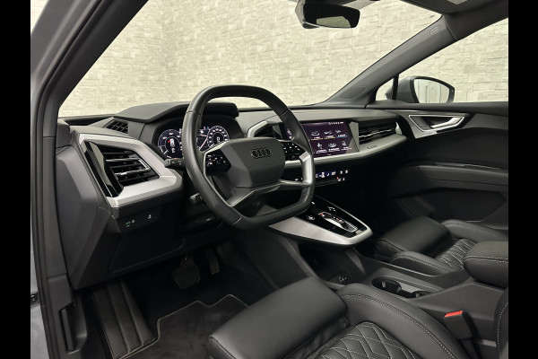 Audi Q4 e-tron 40 S-Line 77 kWh | Panorama | #RS-Leder | Warmtepomp | Sportstoelen | ACC | Lane Ass. | 5x Q4 op voorraad! | MMi+ | Virtual-Cockpit | 3-Zone Climate Control | Getint Glas | Zwarte Hemel | Elktr. A klep | Kieselgrijs | Btw Auto.