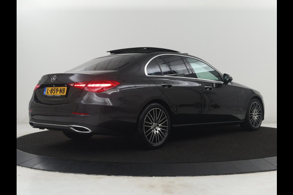 Mercedes-Benz C-Klasse 200 Luxury Line | Panoramadak | Leder | Memory | Adaptive cruise | Stoelverwarming | Burmester | 360 camera | Park assist | Sfeerverlichting | Carplay | Climate control
