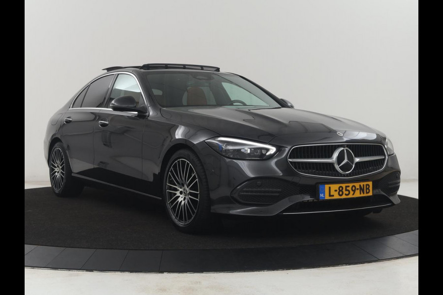 Mercedes-Benz C-Klasse 200 Luxury Line | Panoramadak | Leder | Memory | Adaptive cruise | Stoelverwarming | Burmester | 360 camera | Park assist | Sfeerverlichting | Carplay | Climate control