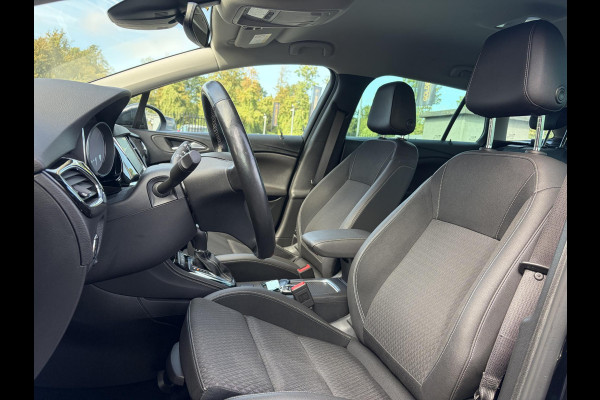 Opel Astra Sports Tourer 1.4 Business Executive ✓2 Eigenaar✓Camera✓Navi✓Trekhaakt✓Carplay✓Stoelverw✓Stuurverw✓Automaat✓Dealer Onderhouden✓Keyless✓Clima✓Cruise✓Pdc V+A✓Halfleder✓Comfortstoelen✓150pk✓Rijstrooksensor✓Dodehoeksensor✓Elekt Stoelen✓Lm velgen✓N.A.P✓Apk tot 03-2027