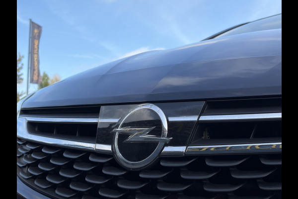 Opel Astra Sports Tourer 1.4 Business Executive ✓2 Eigenaar✓Camera✓Navi✓Trekhaakt✓Carplay✓Stoelverw✓Stuurverw✓Automaat✓Dealer Onderhouden✓Keyless✓Clima✓Cruise✓Pdc V+A✓Halfleder✓Comfortstoelen✓150pk✓Rijstrooksensor✓Dodehoeksensor✓Elekt Stoelen✓Lm velgen✓N.A.P✓Apk tot 03-2027