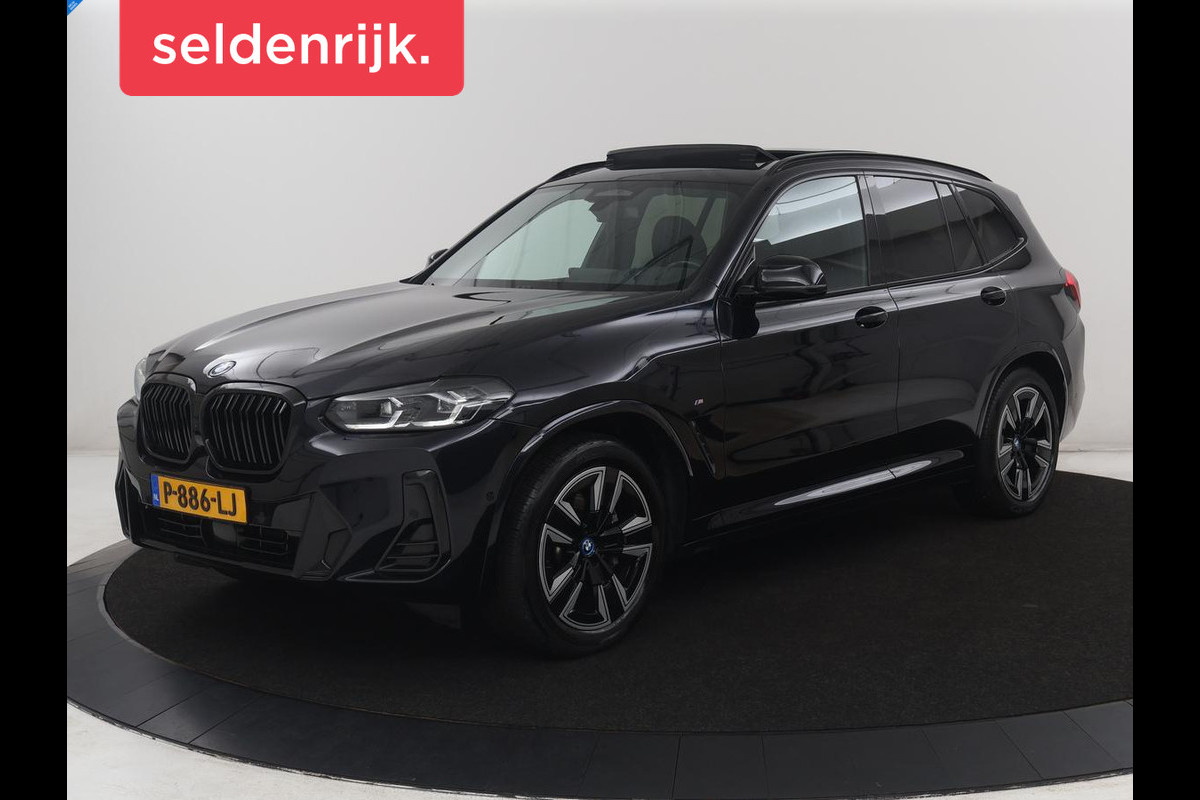 BMW iX3 Executive 80 kWh M-Sport | SOH 94.4% | Panoramadak | Leder | Adaptive cruise | Trekhaak | Carplay | Sfeerverlichting | Memory | Stuur/stoelverwarming | Camera | Park assist |