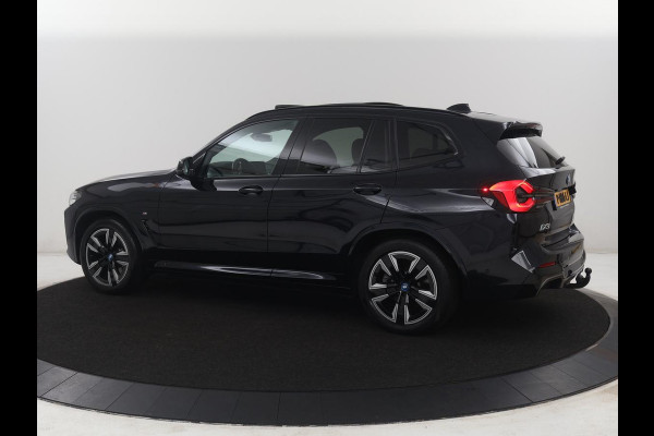 BMW iX3 Executive 80 kWh M-Sport | SOH 94.4% | Panoramadak | Leder | Adaptive cruise | Trekhaak | Carplay | Sfeerverlichting | Memory | Stuur/stoelverwarming | Camera | Park assist |
