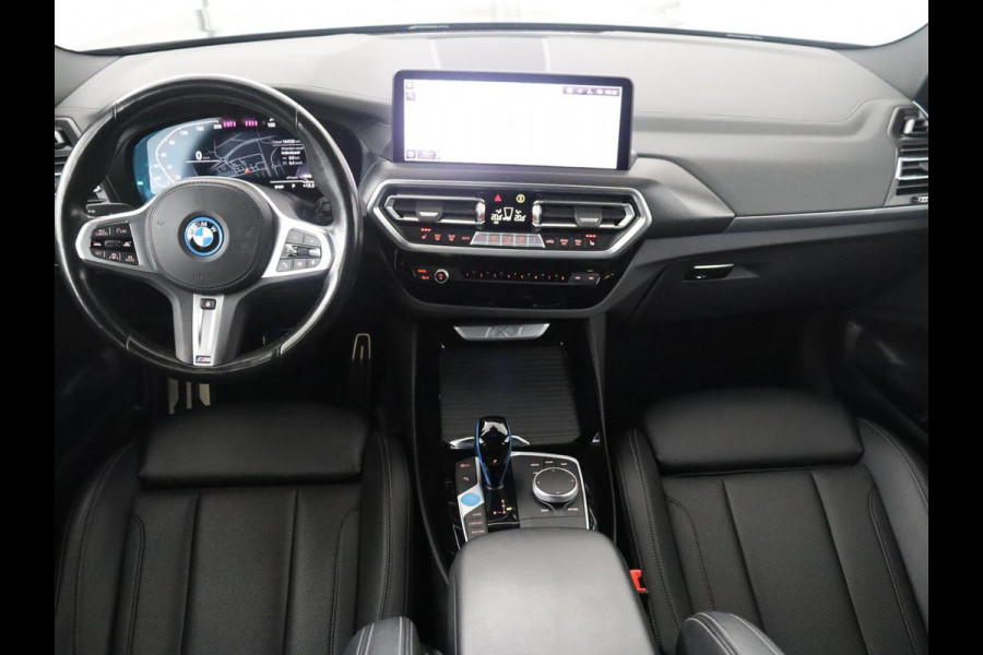 BMW iX3 Executive 80 kWh M-Sport | SOH 94.4% | Panoramadak | Leder | Adaptive cruise | Trekhaak | Carplay | Sfeerverlichting | Memory | Stuur/stoelverwarming | Camera | Park assist |