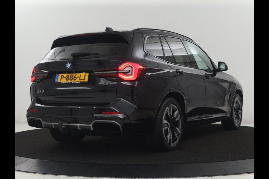 BMW iX3 Executive 80 kWh M-Sport | SOH 94.4% | Panoramadak | Leder | Adaptive cruise | Trekhaak | Carplay | Sfeerverlichting | Memory | Stuur/stoelverwarming | Camera | Park assist |