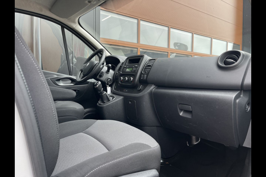 Renault Trafic 2.0 dCi 120pk L2 Comfort 3p Lease €287 p/m, Trekhaak, 2 Schuifdeuren, Airco, PDC, Cruise controle, Onderhoudshistorie aanwezig