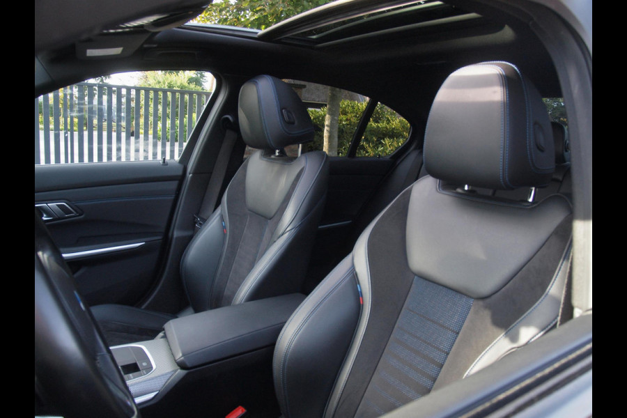 BMW 3 Serie 318i Business Edition | M-Pakket | Panoramadak | Trekhaak | Camera | Sfeerverlichting | Sportstoelen | NL-Auto |