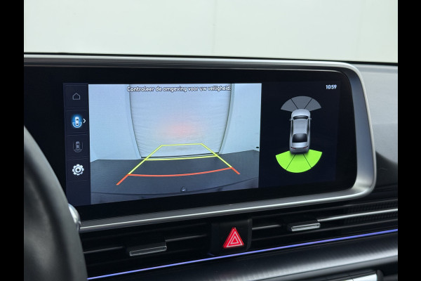 Hyundai IONIQ 6 77.4kWh 229PK Trekhaak SOH 100% Warmtepomp Adap.Cruise Head-Up Stoel+Achterbank+Stuur Verwarming Camera Navi Pdc Apple Carplay A Elek. Achterklep Privacy Glas Lmv Led Lane Assist 1.500KG Trekgewicht 1e Eigenaar Origineel Nederlandse Auto