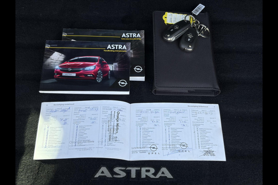 Opel Astra Sports Tourer 1.4 Turbo Online Edition ✓150pk✓2e Eigenaar✓Camera✓Carplay✓Navi✓Pdc V+A✓Stoelverw✓Stuurverw✓Clima✓Cruise✓Lm velgen✓6 Bak✓Comfortstoelen✓Dealer Onderhouden✓N.A.P✓Bj 12-2018✓Apk tot 01-2027