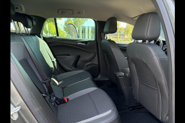 Opel Astra Sports Tourer 1.2 Business Elegance ✓1e Eigenaar✓110pk✓Carplay✓Camera✓Navi✓Clima✓Cruise✓Halfleder✓Comfortstoel✓Pdc V+A✓6 Bak✓Dealer Onderhouden✓Keyless✓Lm velgen✓N.A.P✓Apk tot 06-2027