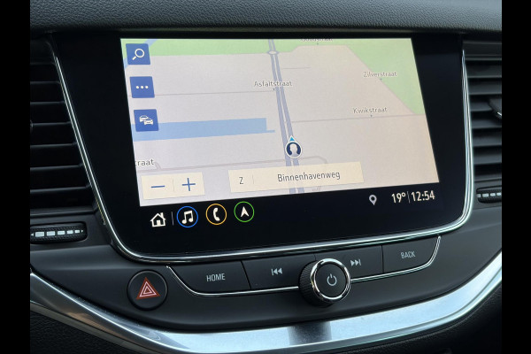 Opel Astra Sports Tourer 1.2 Business Elegance ✓1e Eigenaar✓110pk✓Carplay✓Camera✓Navi✓Clima✓Cruise✓Halfleder✓Comfortstoel✓Pdc V+A✓6 Bak✓Dealer Onderhouden✓Keyless✓Lm velgen✓N.A.P✓Apk tot 06-2027