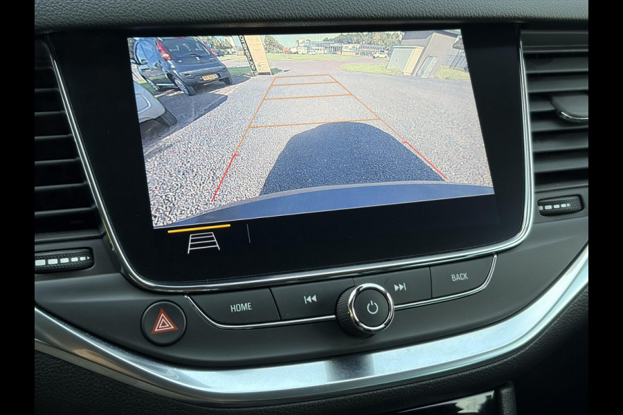 Opel Astra Sports Tourer 1.2 Business Elegance ✓1e Eigenaar✓110pk✓Carplay✓Camera✓Navi✓Clima✓Cruise✓Halfleder✓Comfortstoel✓Pdc V+A✓6 Bak✓Dealer Onderhouden✓Keyless✓Lm velgen✓N.A.P✓Apk tot 06-2027