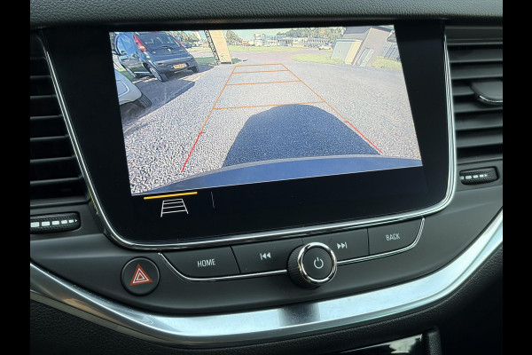 Opel Astra Sports Tourer 1.2 Business Elegance ✓1e Eigenaar✓110pk✓Carplay✓Camera✓Navi✓Clima✓Cruise✓Halfleder✓Comfortstoel✓Pdc V+A✓6 Bak✓Dealer Onderhouden✓Keyless✓Lm velgen✓N.A.P✓Apk tot 06-2027