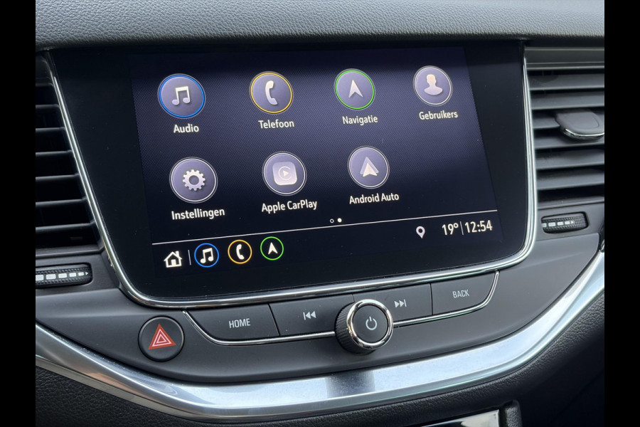 Opel Astra Sports Tourer 1.2 Business Elegance ✓1e Eigenaar✓110pk✓Carplay✓Camera✓Navi✓Clima✓Cruise✓Halfleder✓Comfortstoel✓Pdc V+A✓6 Bak✓Dealer Onderhouden✓Keyless✓Lm velgen✓N.A.P✓Apk tot 06-2027