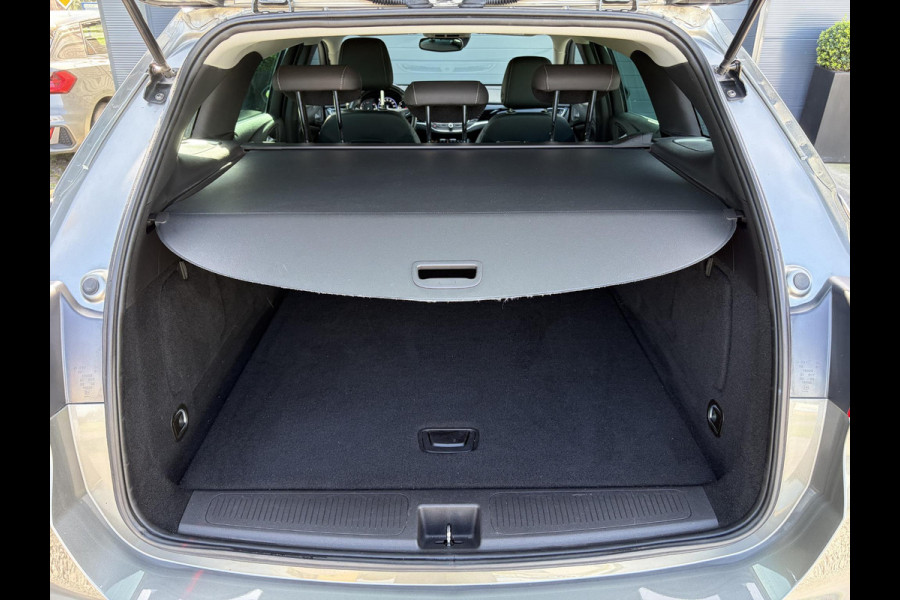 Opel Astra Sports Tourer 1.2 Business Elegance ✓1e Eigenaar✓110pk✓Carplay✓Camera✓Navi✓Clima✓Cruise✓Halfleder✓Comfortstoel✓Pdc V+A✓6 Bak✓Dealer Onderhouden✓Keyless✓Lm velgen✓N.A.P✓Apk tot 06-2027