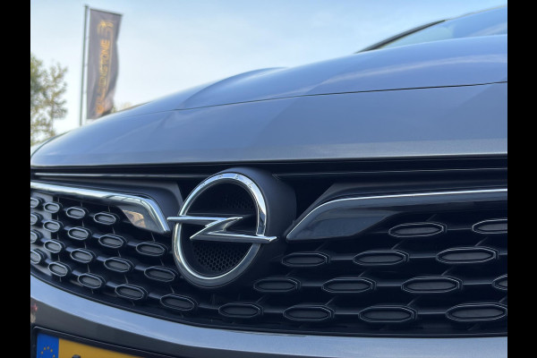 Opel Astra Sports Tourer 1.2 Business Elegance ✓1e Eigenaar✓110pk✓Carplay✓Camera✓Navi✓Clima✓Cruise✓Halfleder✓Comfortstoel✓Pdc V+A✓6 Bak✓Dealer Onderhouden✓Keyless✓Lm velgen✓N.A.P✓Apk tot 06-2027