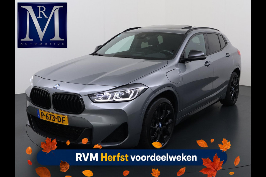 BMW X2 xDrive25e M SPORT Business Edition Plus VAN: 30.900,- VOOR: 27.330,- UW HERFSTVOORDEEL: 3.570,-  BOMVOL | PHEV| PANO| NAP| STOEL + STUURVERWARMING| COMFORT ACCESS| ELEK. ACHTERKLEP| AFNEEMBARE TREKHAAK| HUD| ACHTERUITRIJCAMERA| APPLE CARPLAY