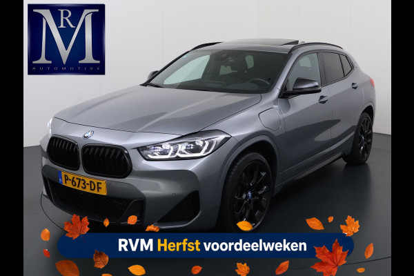 BMW X2 xDrive25e M SPORT Business Edition Plus VAN: 30.900,- VOOR: 27.330,- UW HERFSTVOORDEEL: 3.570,-  BOMVOL | PHEV| PANO| NAP| STOEL + STUURVERWARMING| COMFORT ACCESS| ELEK. ACHTERKLEP| AFNEEMBARE TREKHAAK| HUD| ACHTERUITRIJCAMERA| APPLE CARPLAY