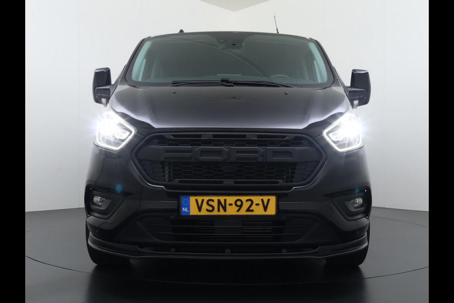Ford Transit Custom 320 2.0TDCI 170PK Automaat L2H1 Dubbele Cabine 2X Schuifdeur Adap.Cruise 5-Persoons Leder+Verwarmd Trekhaak Navi Camera Pdc Appl Euro 6 Lmv 18" Sidebars Betonplex Vloer Wandbetimmering Lane Assist 3.200KG Trekgewicht