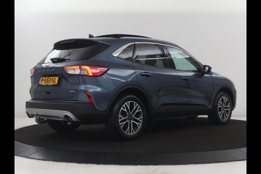 Ford Kuga 2.5 PHEV Titanium | SOH 97,4% | Camera | Trekhaak | Pano.Dak | Dodehoek ASS. | Navigatie |