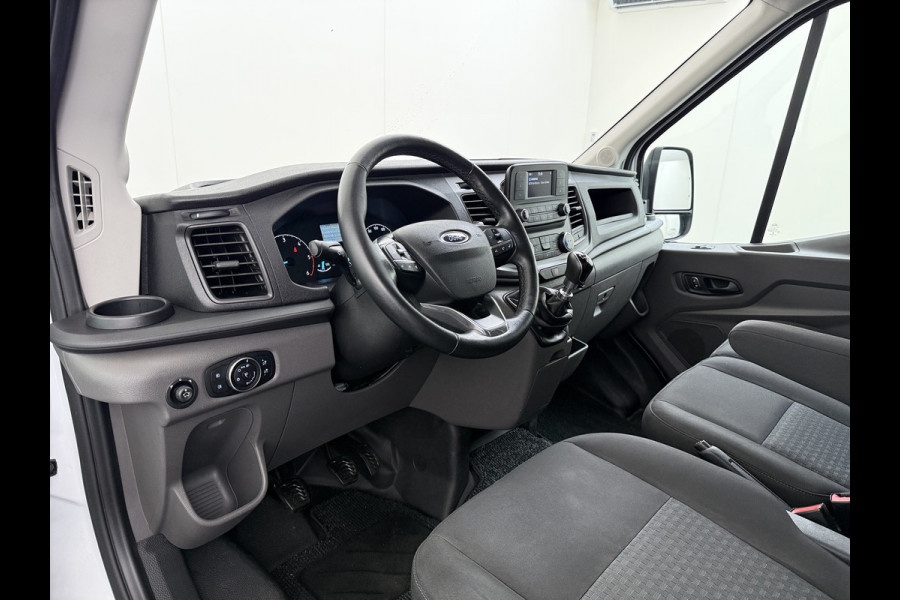 Ford Transit 350 2.0TDCI 130PK Euro 6 L3H2 3-Persoons Camera Stoelverwarming Airco Cruise Control Bluetooth Pdc Voorruit verwarmbaar Wandbetimmering Schuifdeur Wifi Dealeronderhouden