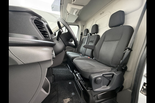 Ford Transit 350 2.0TDCI 130PK Euro 6 L3H2 3-Persoons Camera Stoelverwarming Airco Cruise Control Bluetooth Pdc Voorruit verwarmbaar Wandbetimmering Schuifdeur Wifi Dealeronderhouden