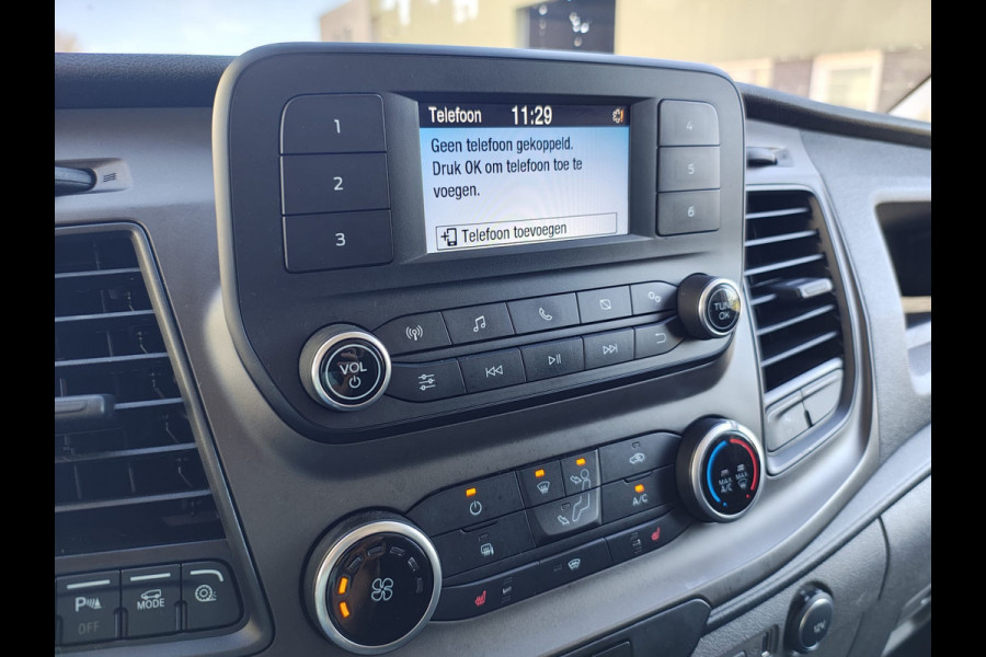 Ford Transit 350 2.0TDCI 130PK Euro 6 L3H2 3-Persoons Camera Stoelverwarming Airco Cruise Control Bluetooth Pdc Voorruit verwarmbaar Wandbetimmering Schuifdeur Wifi Dealeronderhouden