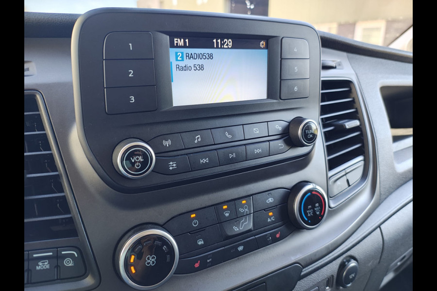 Ford Transit 350 2.0TDCI 130PK Euro 6 L3H2 3-Persoons Camera Stoelverwarming Airco Cruise Control Bluetooth Pdc Voorruit verwarmbaar Wandbetimmering Schuifdeur Wifi Dealeronderhouden