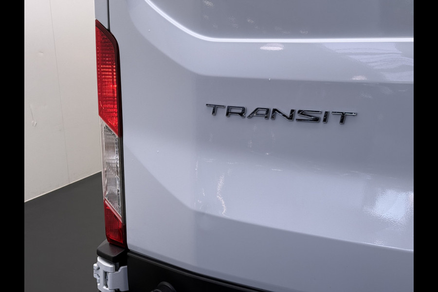 Ford Transit 350 2.0TDCI 130PK Euro 6 L3H2 3-Persoons Camera Stoelverwarming Airco Cruise Control Bluetooth Pdc Voorruit verwarmbaar Wandbetimmering Schuifdeur Wifi Dealeronderhouden