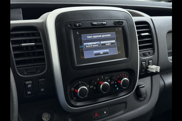 Renault Trafic 2.0DCi 120PK T29 Euro 6 3-Persoons 2X Schuifdeur Trekhaak Navi Airco Bluetooth Cruise Control DAB L1H1 Betonplex vloer Wandbetimmering 2.000KG Trekgewicht 1e Eigenaar Origineel Nederlandse Auto