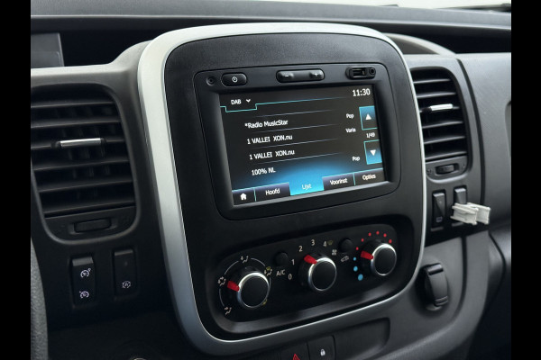 Renault Trafic 2.0DCi 120PK T29 Euro 6 3-Persoons 2X Schuifdeur Trekhaak Navi Airco Bluetooth Cruise Control DAB L1H1 Betonplex vloer Wandbetimmering 2.000KG Trekgewicht 1e Eigenaar Origineel Nederlandse Auto