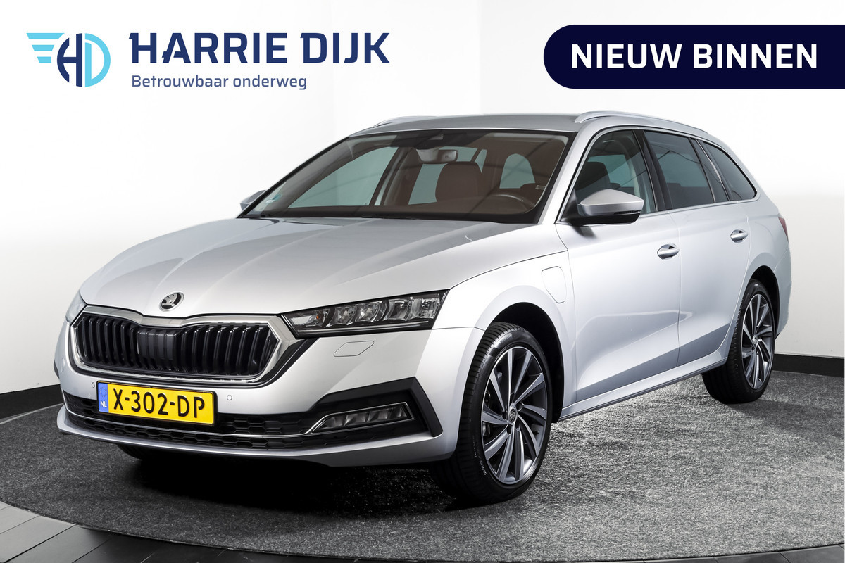Škoda Octavia Combi 1.4 TSI iV PHEV Business Edition Plus | Org. NL | Afn. Trekhaak | Apple CarPlay | ACC | Navi | Stoel- & Stuurverwarming | PDC V+A | Camera | 18" |