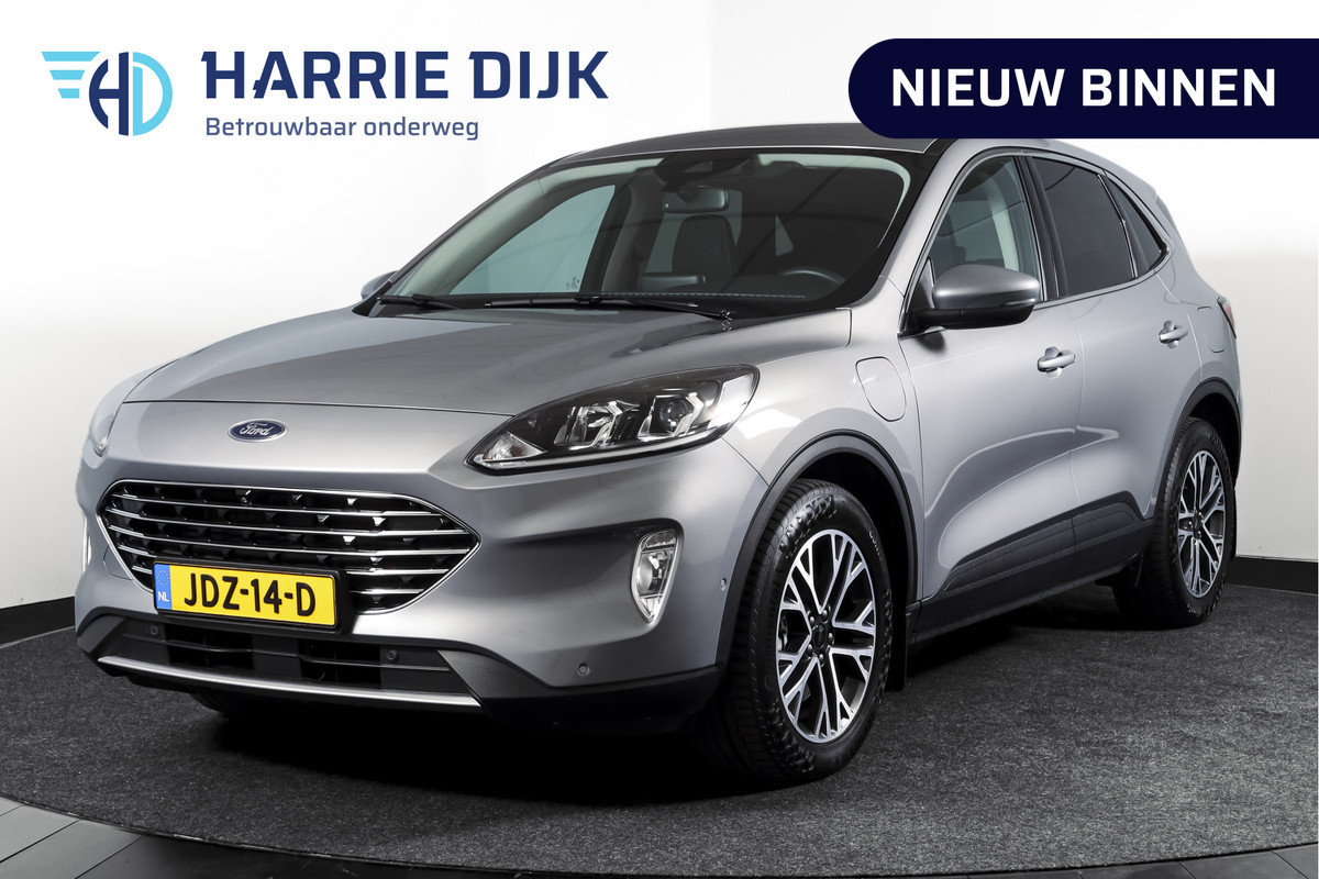 Ford Kuga 2.5 PHEV Titanium | Winterpakket | PDC V+A | Camera V+A | Navi + Carplay | Adapt. Cruise | PDC | Elek. Klep | LM 18" |