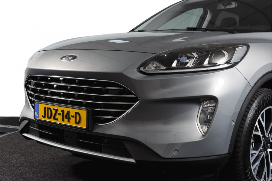 Ford Kuga 2.5 PHEV Titanium | Winterpakket | PDC V+A | Camera V+A | Navi + Carplay | Adapt. Cruise | PDC | Elek. Klep | LM 18" |