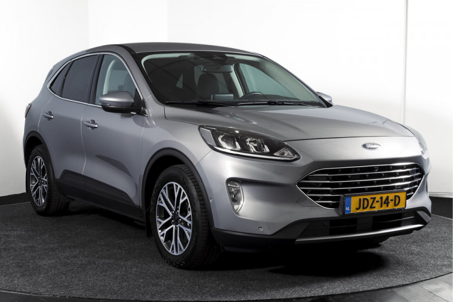 Ford Kuga 2.5 PHEV Titanium | Winterpakket | PDC V+A | Camera V+A | Navi + Carplay | Adapt. Cruise | PDC | Elek. Klep | LM 18" |