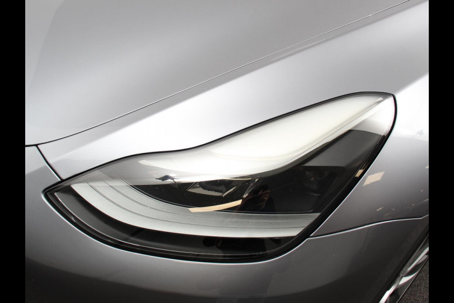 Tesla Model Y Long Range AWD 75 kWh Climate control Adaptieve cruise control Achteruitrijcamera Panoramadak Keyless Stuurverwarming Stoelverwarming LED Navigatie Parkeersensoren
