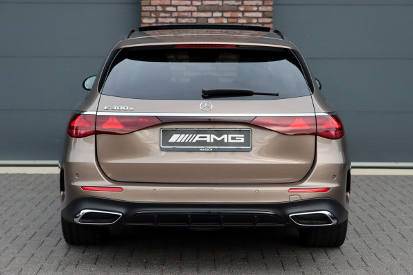 Mercedes-Benz E-Klasse Estate 300 e AMG Line | Hyperscreen | Distronic+ | HUD | 3D-Display | Panoramadak | Burmester | Surround Camera | Trekhaak | Keyless Go |