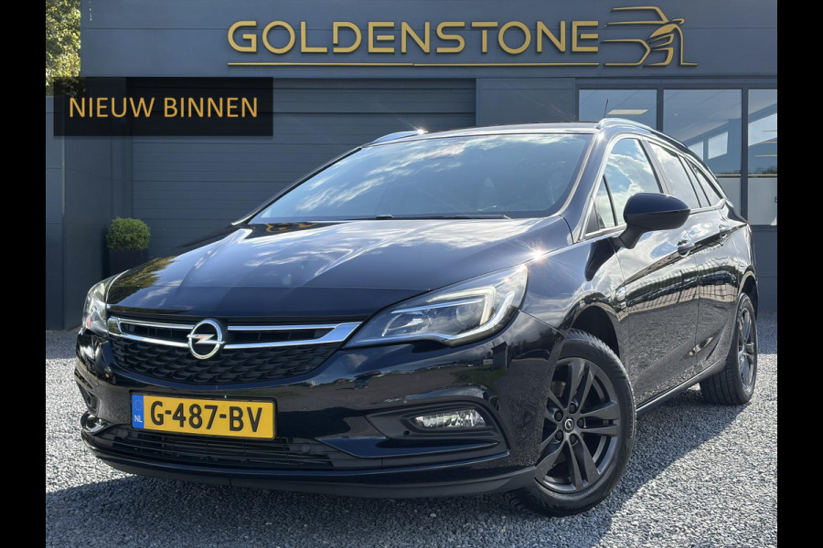 Opel Astra Sports Tourer 1.4 Turbo 120 Jaar Edition ✓150pk✓Carplay✓Navi✓Trekhaak✓Pdc V+A✓Clima✓Cruise✓6 Bak✓Lm velgen✓N.A.P✓Apk tot 02-2028