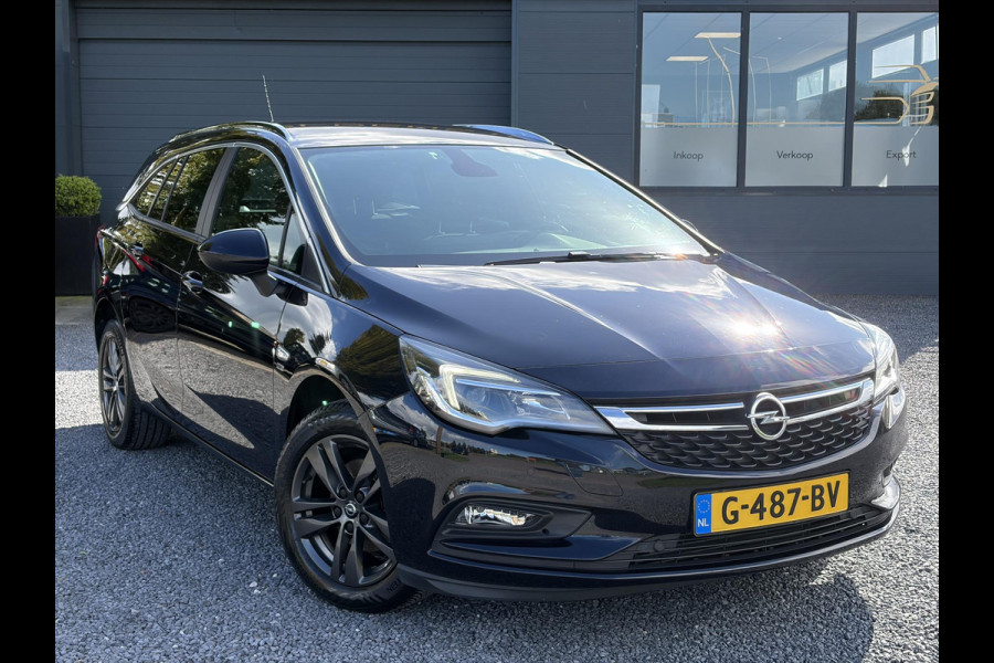 Opel Astra Sports Tourer 1.4 Turbo 120 Jaar Edition ✓150pk✓Carplay✓Navi✓Trekhaak✓Pdc V+A✓Clima✓Cruise✓6 Bak✓Lm velgen✓N.A.P✓Apk tot 02-2028