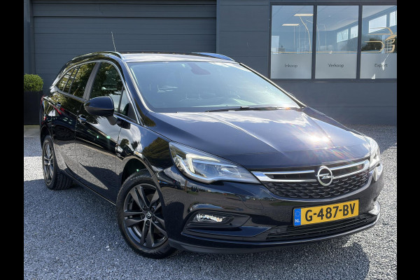 Opel Astra Sports Tourer 1.4 Turbo 120 Jaar Edition ✓150pk✓Carplay✓Navi✓Trekhaak✓Pdc V+A✓Clima✓Cruise✓6 Bak✓Lm velgen✓N.A.P✓Apk tot 02-2028