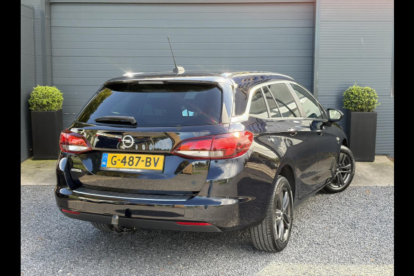 Opel Astra Sports Tourer 1.4 Turbo 120 Jaar Edition ✓150pk✓Carplay✓Navi✓Trekhaak✓Pdc V+A✓Clima✓Cruise✓6 Bak✓Lm velgen✓N.A.P✓Apk tot 02-2028