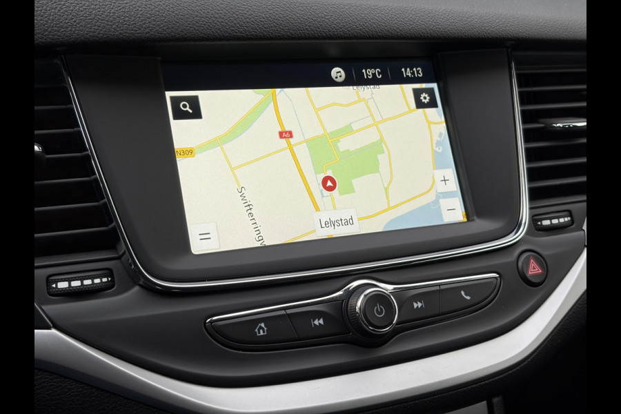 Opel Astra Sports Tourer 1.4 Turbo 120 Jaar Edition ✓150pk✓Carplay✓Navi✓Trekhaak✓Pdc V+A✓Clima✓Cruise✓6 Bak✓Lm velgen✓N.A.P✓Apk tot 02-2028