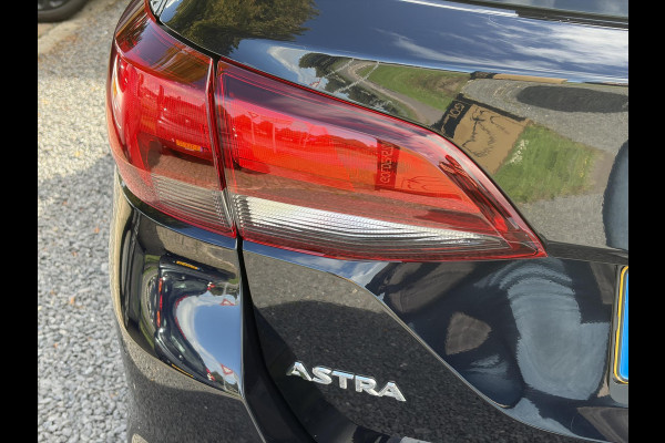 Opel Astra Sports Tourer 1.4 Turbo 120 Jaar Edition ✓150pk✓Carplay✓Navi✓Trekhaak✓Pdc V+A✓Clima✓Cruise✓6 Bak✓Lm velgen✓N.A.P✓Apk tot 02-2028
