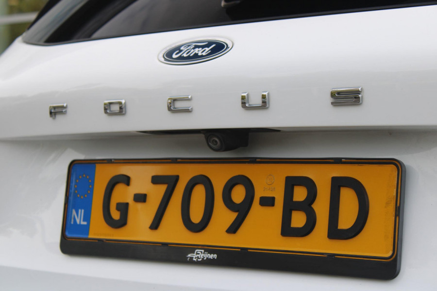 Ford Focus 1.5 EcoBoost 150PK AUTOMAAT ACTIVE BUSINESS | AFNEEMBARE TREKHAAK | TECHNOLOGY PACK: (ADAPTIVE CRUISE CONTROL, GROOTLICHT ASSISTENT, TRAFFIC SIGN RECOGNITION, EVASIVE STEERING ASSIST, DRIVER ALERT, LANE CENTRING ASSIST EN STOP & GO) | PARKING PACK: (VOLLEDIG AUTOMATISCH INPARKEREN, WIDE VIEW ACHTERUITRIJ CAMERA, DOOR EDGE PROTECTORS) | BANG & OLUFSEN AUDIOSYSTEM: (9 SPEAKERS EN 1 SUBWOOVER ,DAB+ RADIO) | COMFORT PACK: (AUTOMATISCHE AIRCONDITIONING, FORD KEYLESS ENTRY/START) | DESIGN PACK 2 ACTIVE BUSINESS: (PRIVACY GLASS, 18" Y-DESIGN BLACK LICHTMETALEN VELGEN, FULL LE