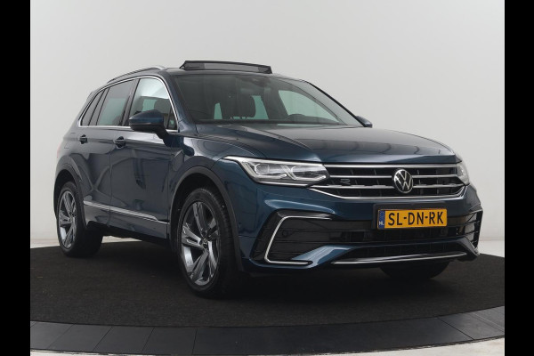 Volkswagen Tiguan 1.4 TSi PHEV R-Line Life Edition | SOH 91,0% | Panoramadak | Memory | Leder | Stuur/stoel verwarming | Adaptive cruise | Sfeerverlichting | 360 camera | Park assist | Carplay | Elektrische achterklep