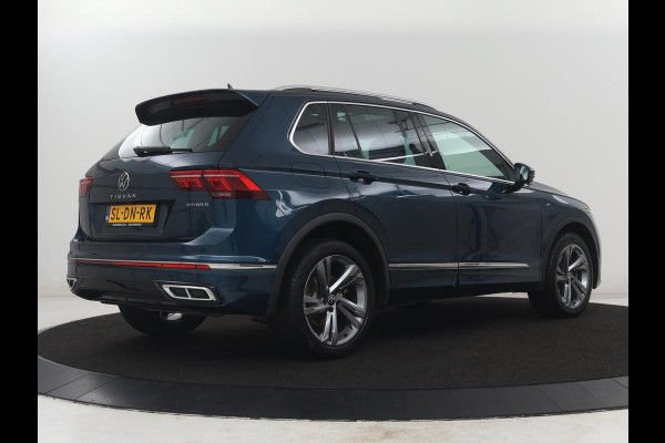 Volkswagen Tiguan 1.4 TSi PHEV R-Line Life Edition | SOH 91,0% | Panoramadak | Memory | Leder | Stuur/stoel verwarming | Adaptive cruise | Sfeerverlichting | 360 camera | Park assist | Carplay | Elektrische achterklep