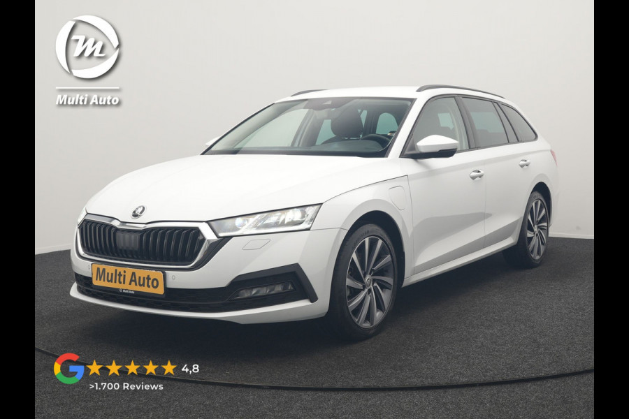 Škoda Octavia Combi 1.4 TSI iV Business Edition PHEV 204pk Dealer O.H | Trekhaak Af Fabriek | Adaptive Cruise | Camera | Stoelmassage | Sportstoelen & Stuur Verwarmd | Keyless | Sfeerverlichting | Crystal LED | Apple Carplay |  Navigatie | 18"L.M | Plug In Hybrid